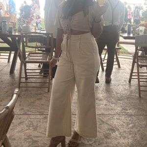 Super cute pants, worn once! Missing button but easy to sew it back on.